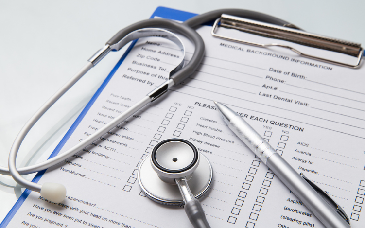 Picture of medical chart with a pen and stethoscope